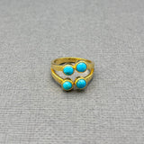 FOUR TURQUOISE OPEN GOLD RING