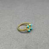 FOUR TURQUOISE OPEN 18KT GOLD RING