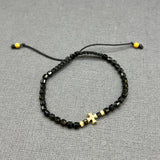 DIAMOND CROSS ON BLACK ONYX BEADED BRACELET
