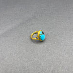 MATT 18KT GOLD RING WITH TURQUOISE STONE AND TWO DIAMONDS