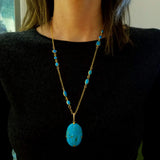TURQUOISE MEDALLION ON TURQUOISE CHAIN
