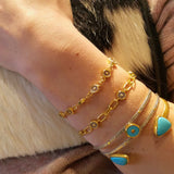 MOONSTONE SIGNATURE SUN SYMBOL GOLD BRACELET