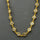 MOONSTONE GOLD SUN SYMBOL NECKLACE