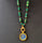 EMERALD SUN GOLD NECKLACE