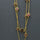 TOURMALINE GOLD SUN NECKLACE
