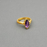 Marquise-cut Amethyst framed with a brushed-matte 14k gold details and band . Hand-crafted for a luxurious feel and fit. Available in multiple sizes.
14k Yellow Gold
Marquise Amethyst
Available in multiple sizes
Hand Crafted