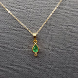 EMERALD OR SAPPHIRE AND DIAMOND PENDANT