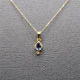 EMERALD OR SAPPHIRE AND DIAMOND PENDANT