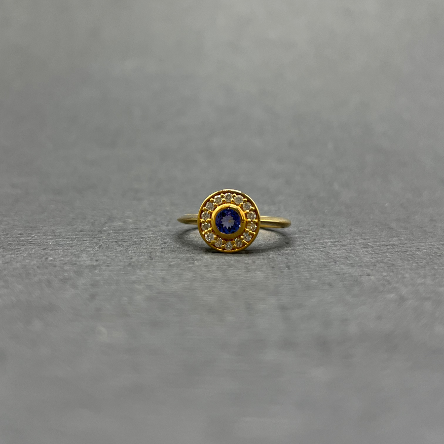 TANZANITE AND DIAMOND HALO RING