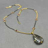 PINK TOURMALINE AND RUTILE PENDANT