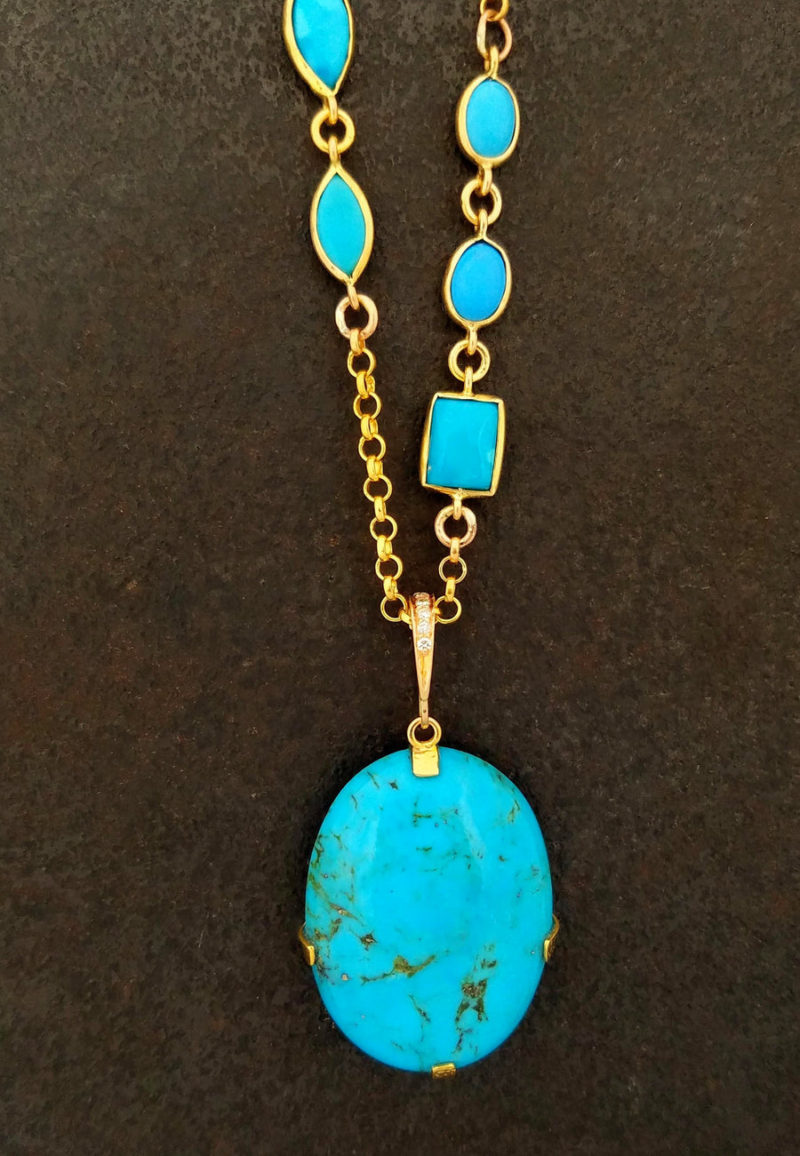 TURQUOISE MEDALLION ON TURQUOISE CHAIN