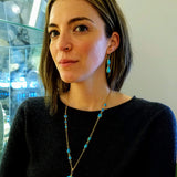 TURQUOISE MEDALLION ON TURQUOISE CHAIN