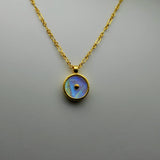 MOONSTONE GOLD SUN SYMBOL NECKLACE