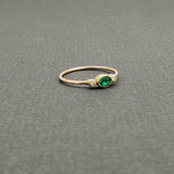 EMERALD AND DIAMONDS RING